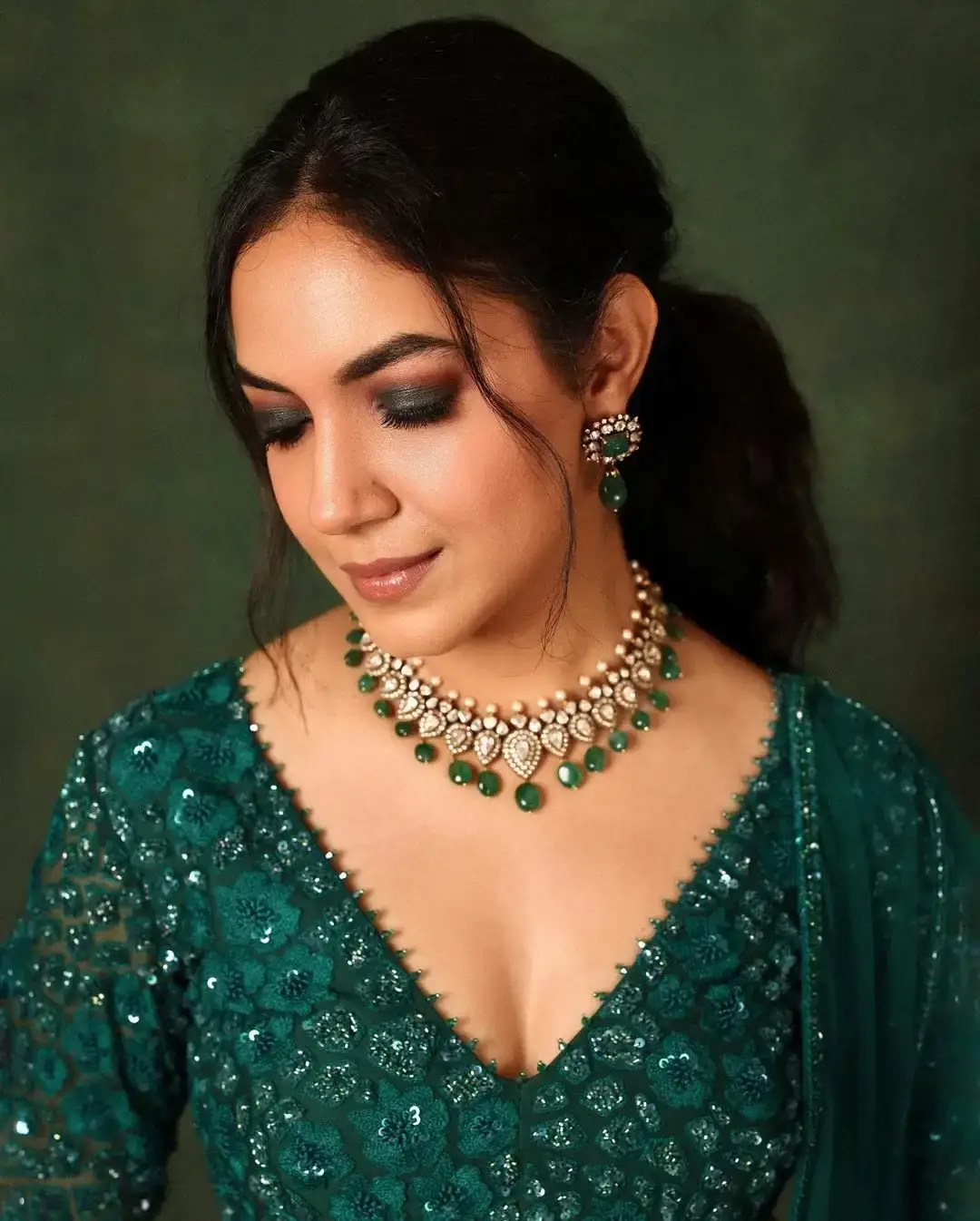 Actress Ritu Varma in Green Embroidered Lehenga Choli